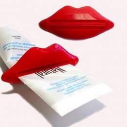 1 pieza caliente nuevo tubo de pasta de dientes exprimidor Sexy rojas con forma de labios baño tubo exprimidor dispensador crema