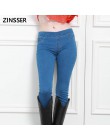 Otoño Invierno minimalista mujeres Denim elástico falso bolsillo delantero media cintura lavado azul Delgado señora Jeans