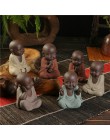 Estatuas de Buda pequeño monje color arena cerámica hogar club geomántico decoración púrpura arena estatuillas té mascota