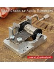 Mini manivela de mano movimiento de música DIY caja de música coleccionables decorativos una variedad de música disponible Drops